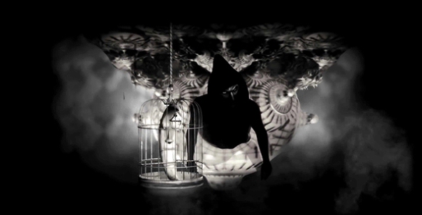 As Muse sings about the Handler, a bunch of symbolic characters move in front of him. Here, a moon crescent inside a cage represent the imprisonment of the MK slave.